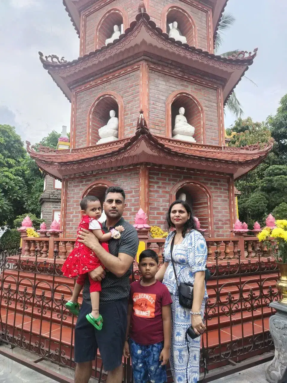 bookvietnamholiday.com family at Trấn Quốc Pagoda, Hanoi