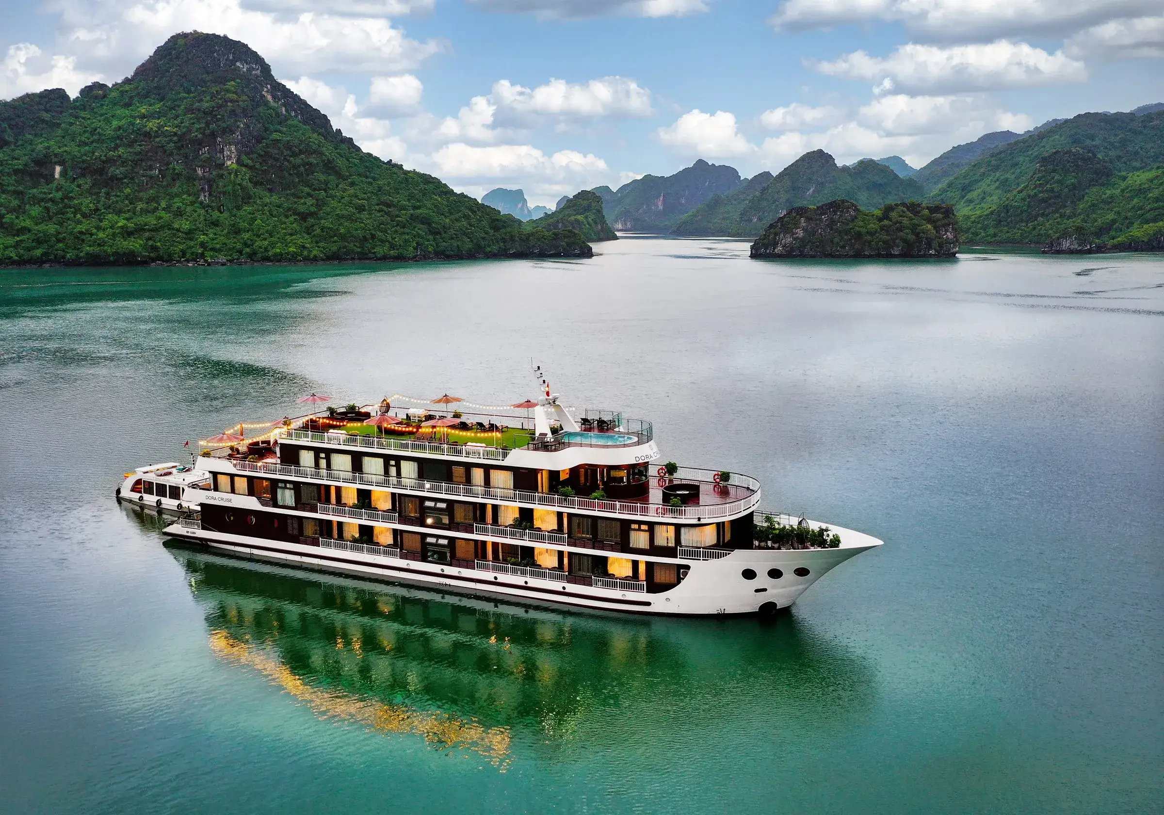 Lan Ha Bay day cruise limestone karsts emerald water Cat Ba Vietnam