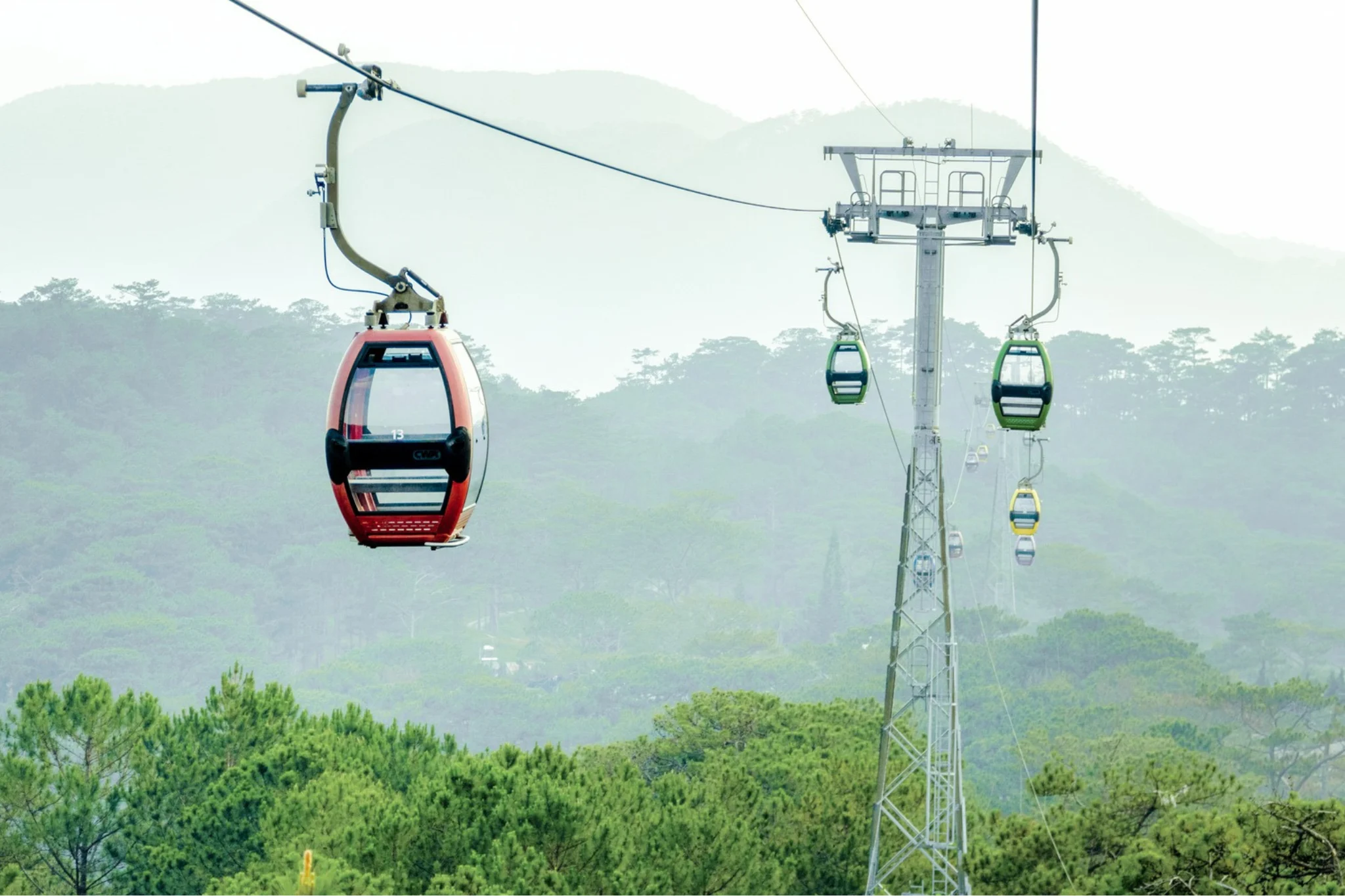 Da Lat cable car pine forest valley Truc Lam monastery Vietnam