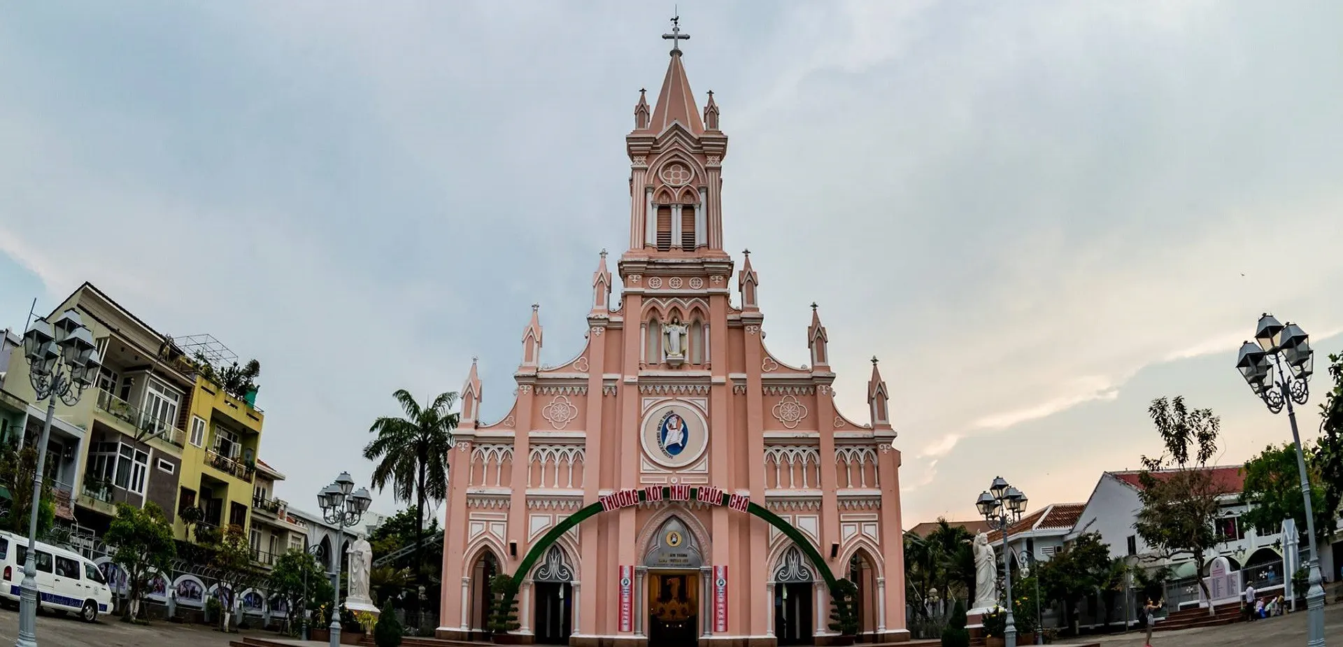 Pink Da Nang Cathedral with rooster weather vane