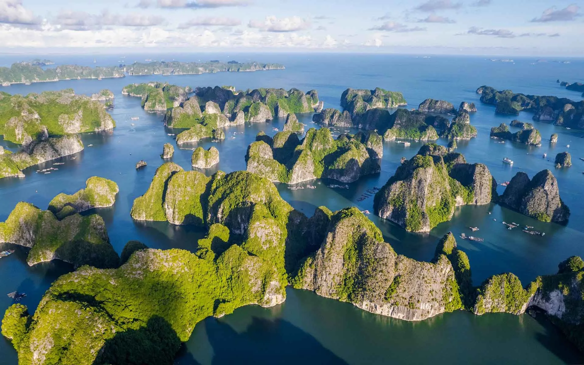 Cat Ba Island beach and limestone hills Vietnam
