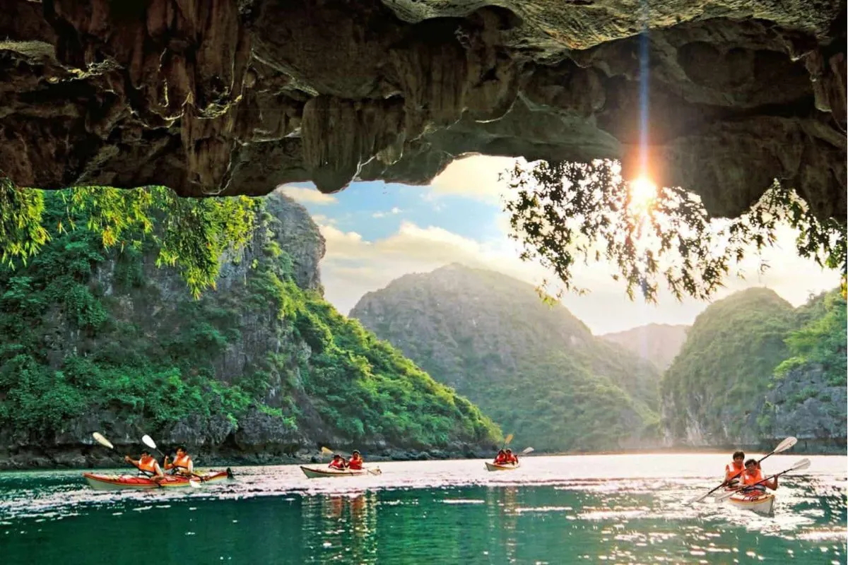 Kayaking through the dark tunnel of Hang Sang Hang Toi Ha Long Bay