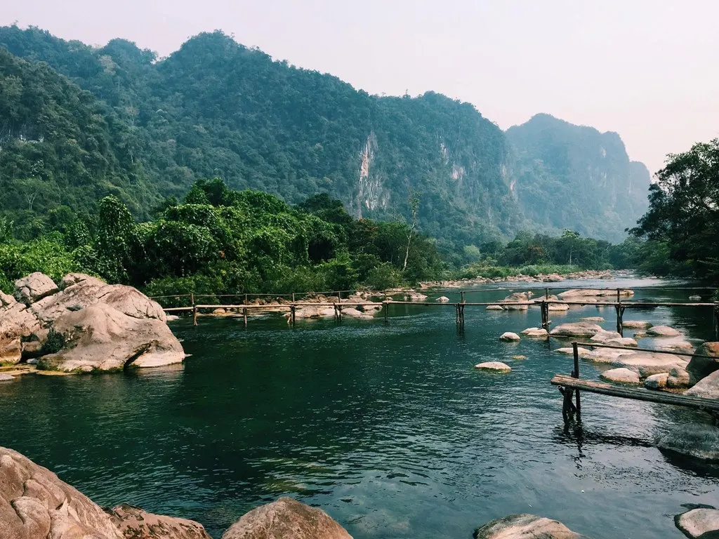Nuoc Mooc Eco-Trail natural pool crystal clear water forest Phong Nha Vietnam