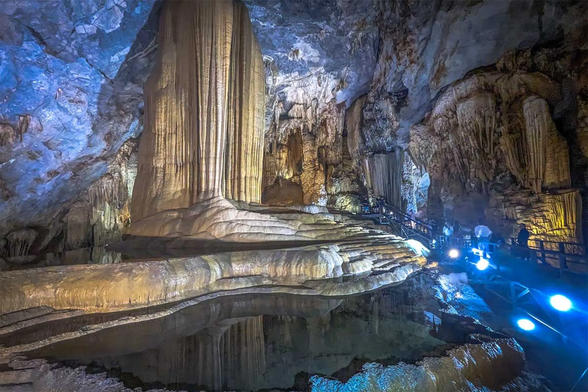 Paradise Cave Thien Duong massive stalactite chamber wooden walkway Phong Nha Vietnam