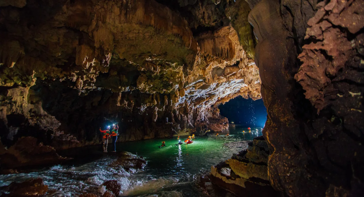 Tu Lan Cave System jungle river swimming expedition Phong Nha Vietnam