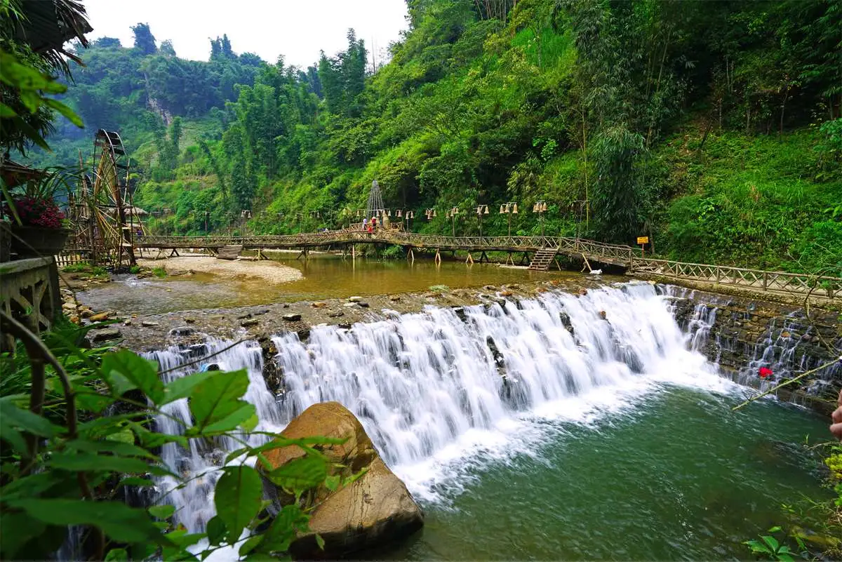 Cat Cat Black Hmong village waterfall and traditional architecture near Sapa Vietnam