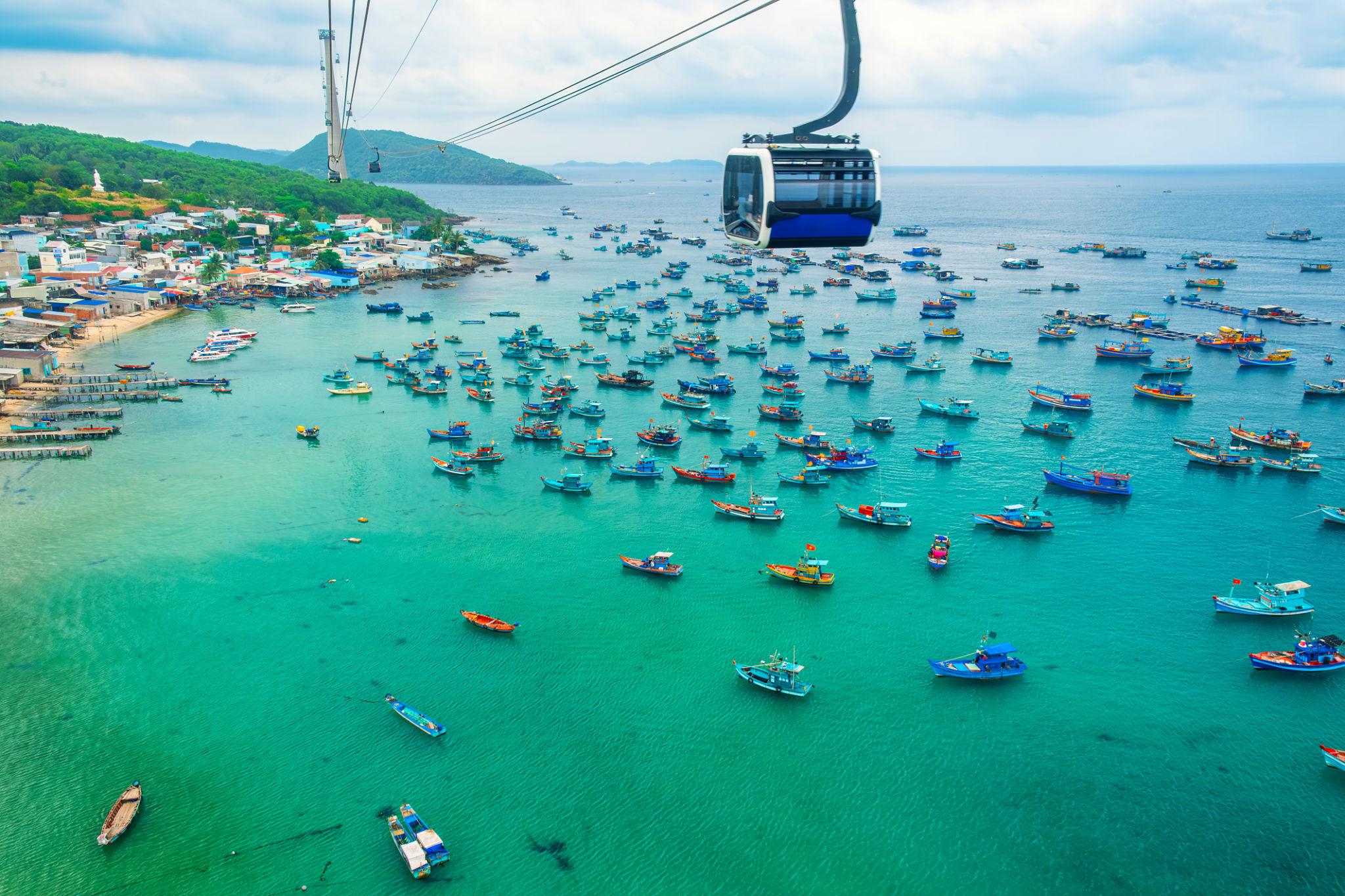 Phu Quoc beach with turquoise water and palm trees